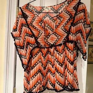 Colorful lightweight top. Great for summer/warm weather. Easy fit